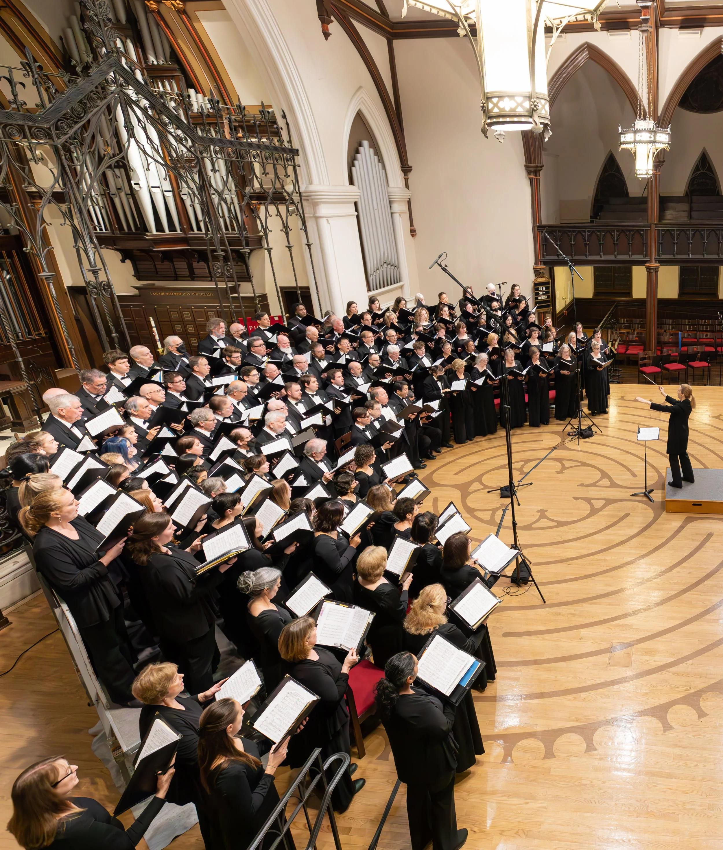 Erin Freeman conducting the City Choir at the Church of the Epiphany.