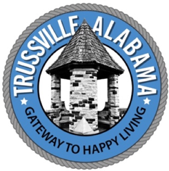 Seal of Trussville, Alabama featuring a small stone structure with a thatched roof
