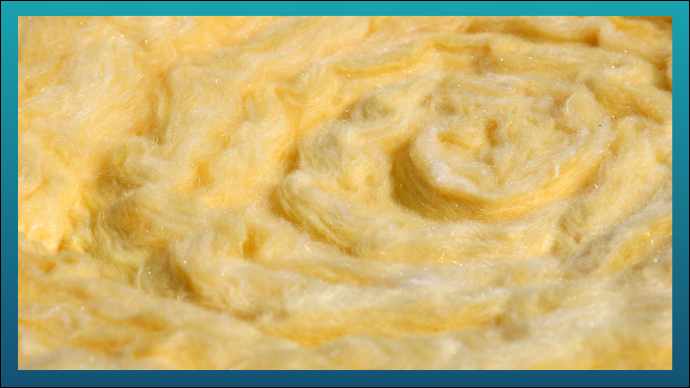 Close-up of butter being churned or whipped to make a creamy, yellow, textured substance.