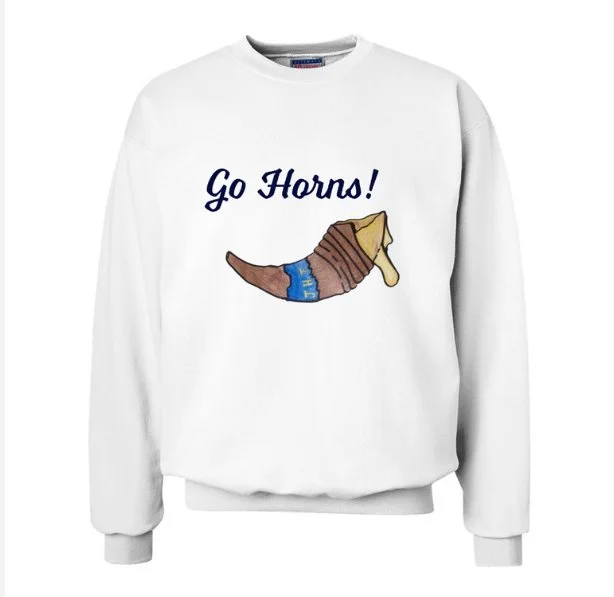White sweatshirt with a dog wearing a sweater and jeans, and the text 'Go Horns!'