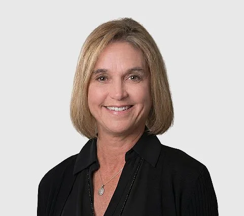 Portrait of Kim Schulte, CFO at Koss Corporation.