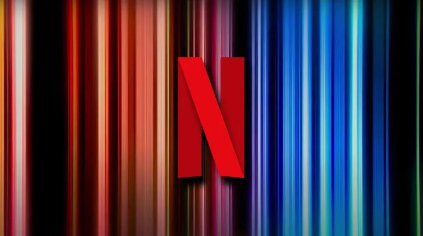Netflix logo in front of colorful vertical light streaks.