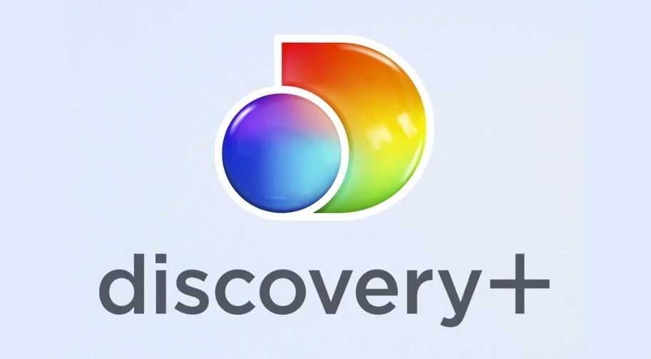 Discovery+ logo with a multicolored circular icon and the word 'discovery+' underneath.