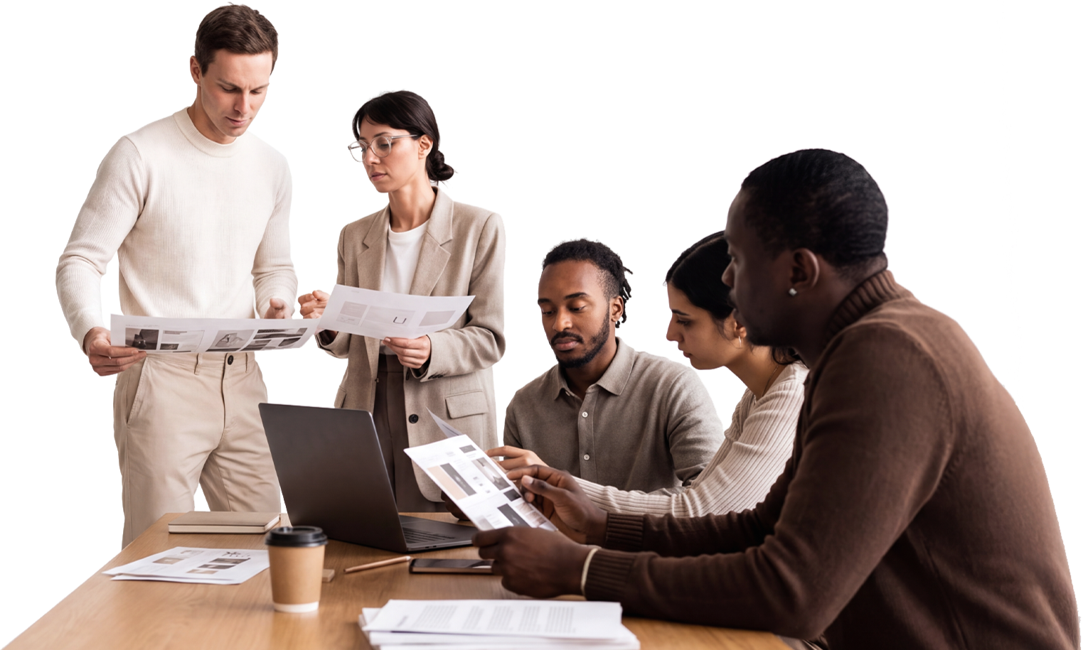 Five diverse professionals in a meeting reviewing documents and working on a laptop, in a modern office.