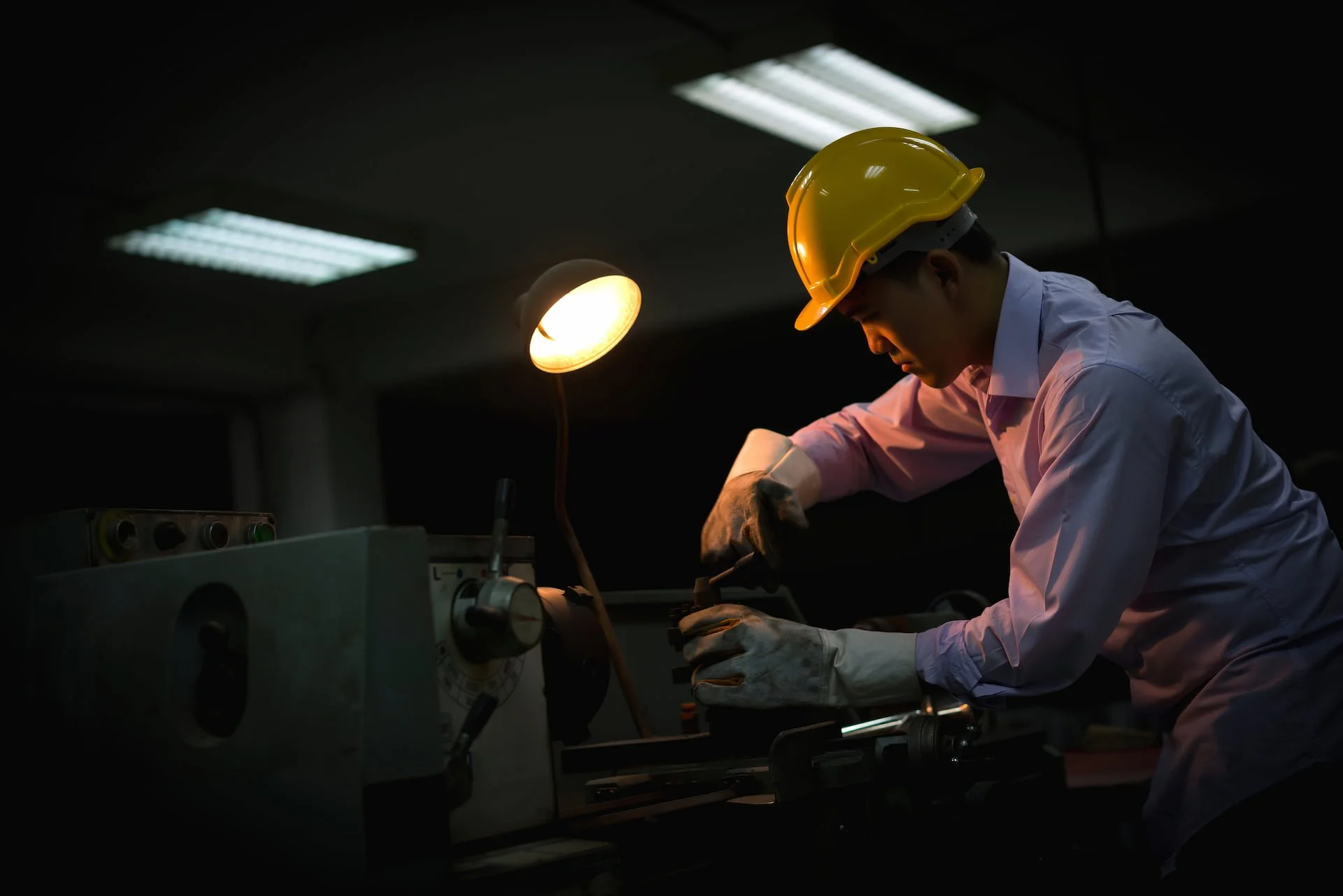 Person working under a focused production light.