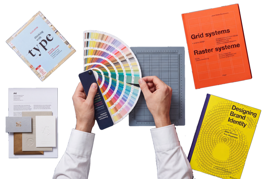 Hands holding colour swatches beside typography and grid-system references.