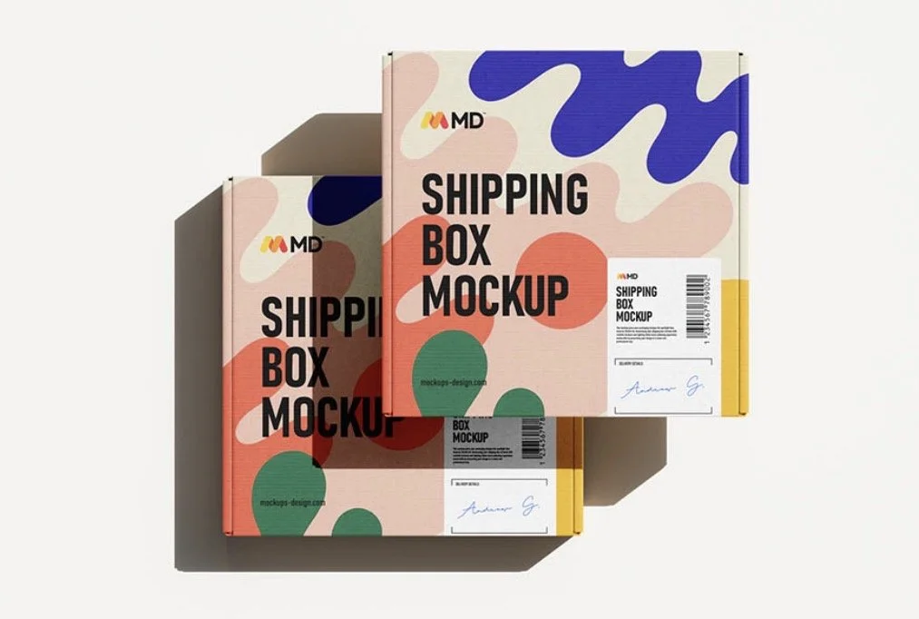 Branded shipping-box mockups with colourful graphics.