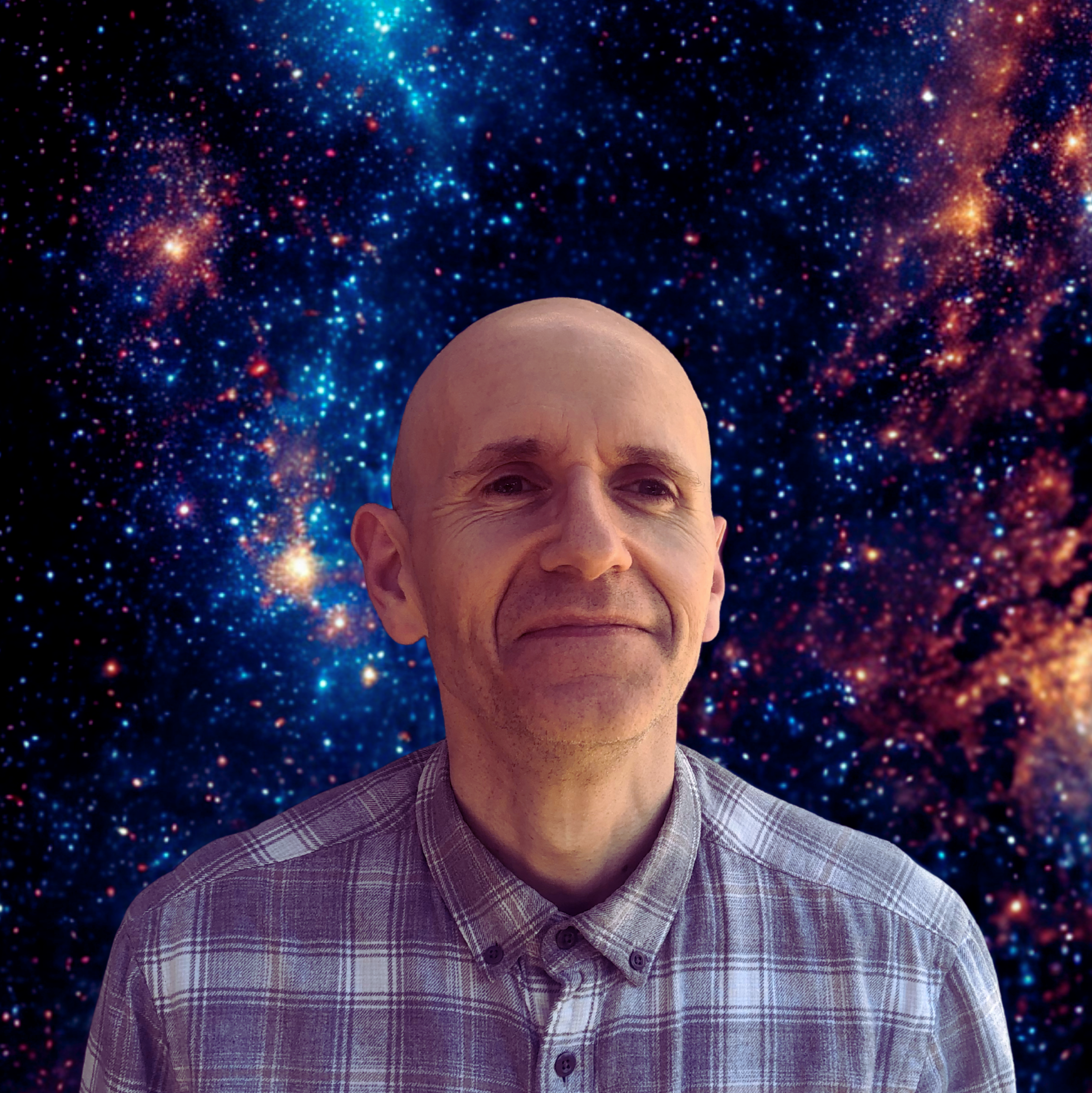 The author wearing a plaid shirt, standing in front of a colourful starry galaxy background.