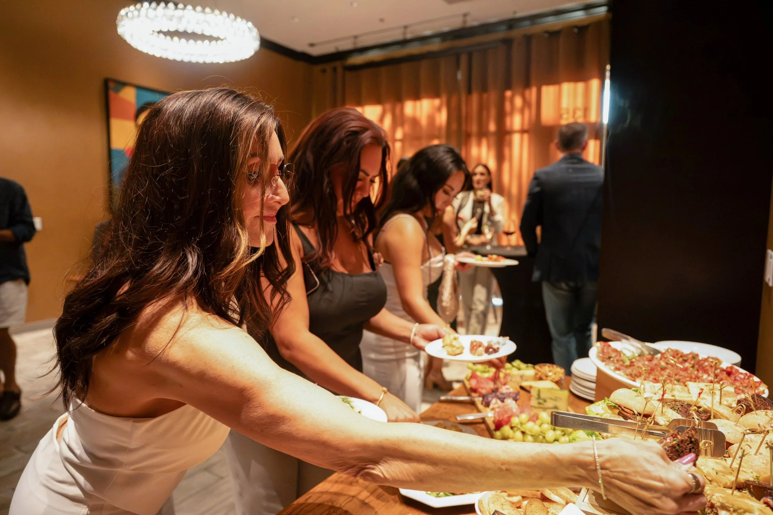 Buffet spread set for a group of more than twenty-five guests