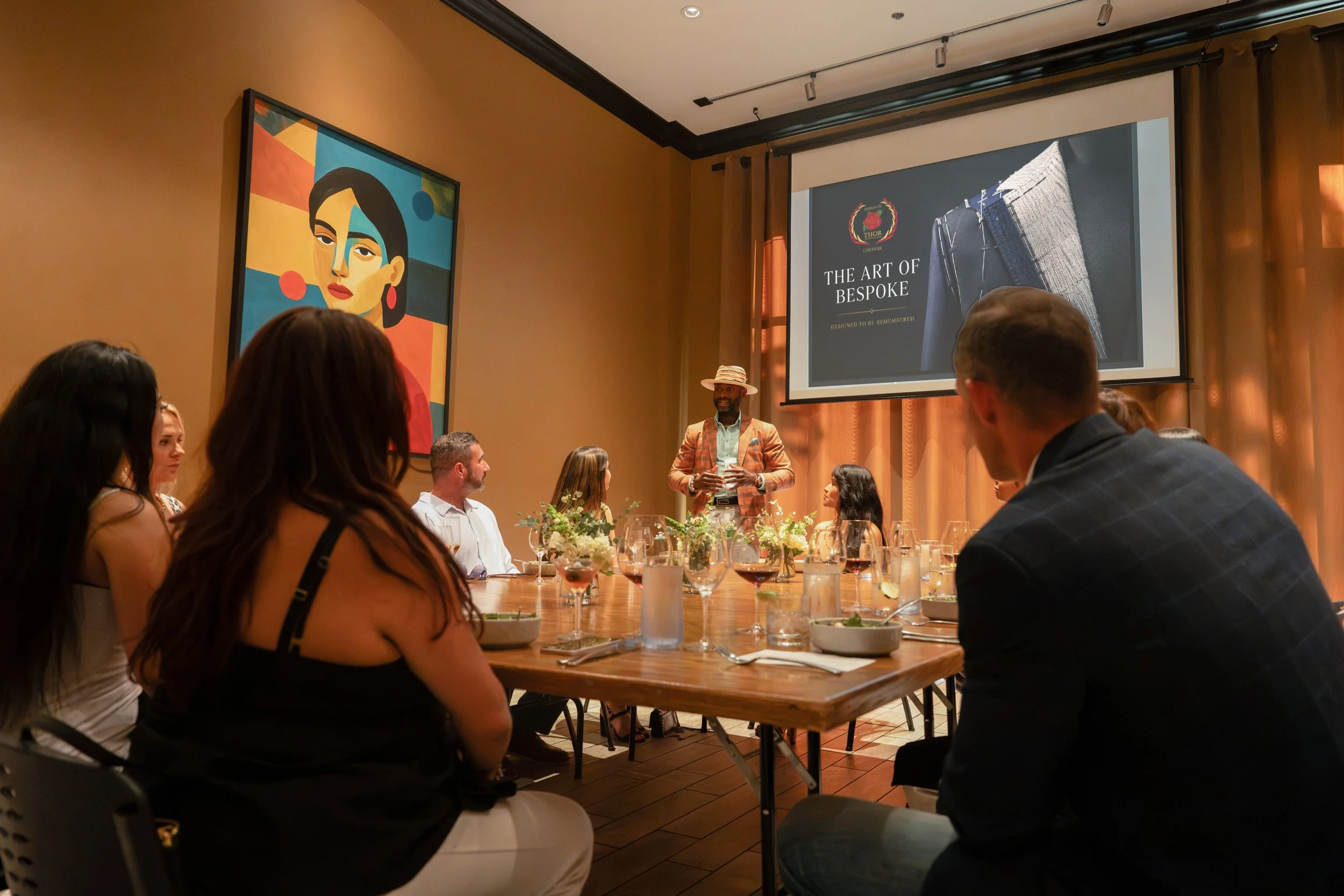 Projector screen and seating arranged for a business presentation