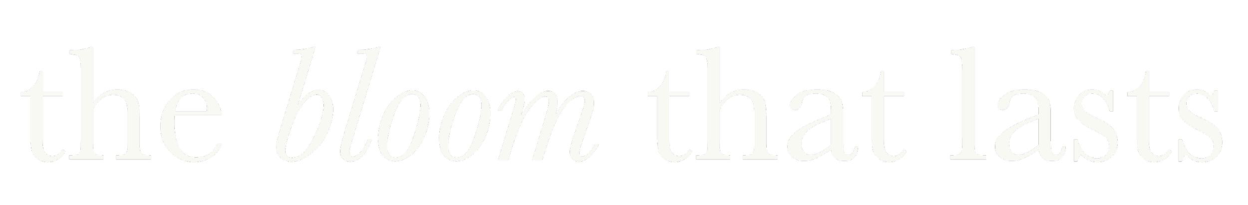 Text saying 'the bloom that lasts' in white and pink script on a black background