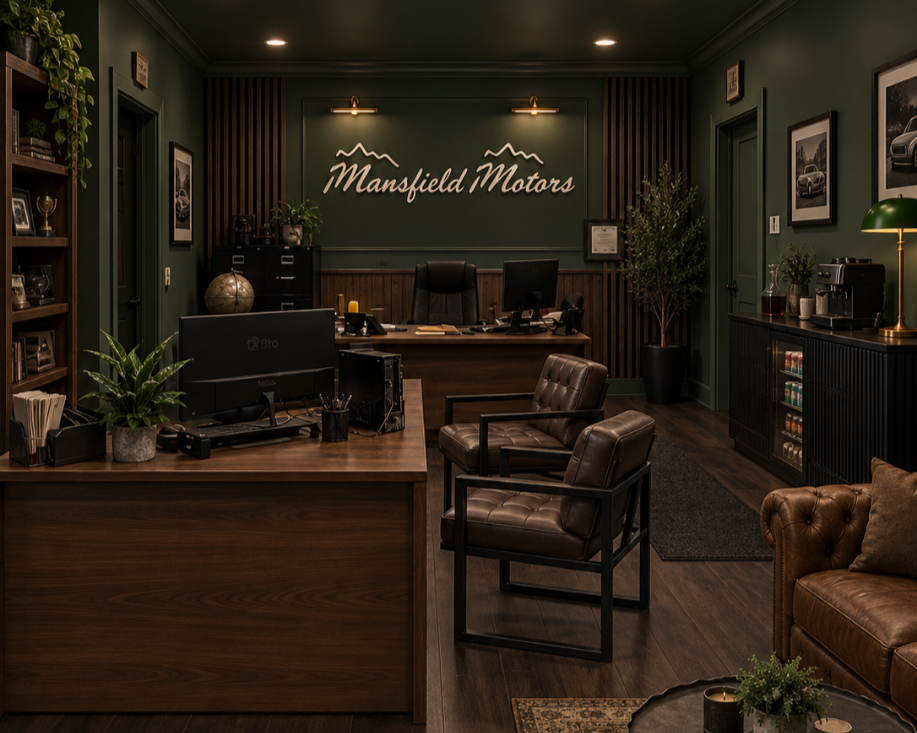 3D Rendering of the Mansfield Motors dealership office with moody green walls, dark wood acoustic paneling, leather furniture and an illuminated logo wall.
