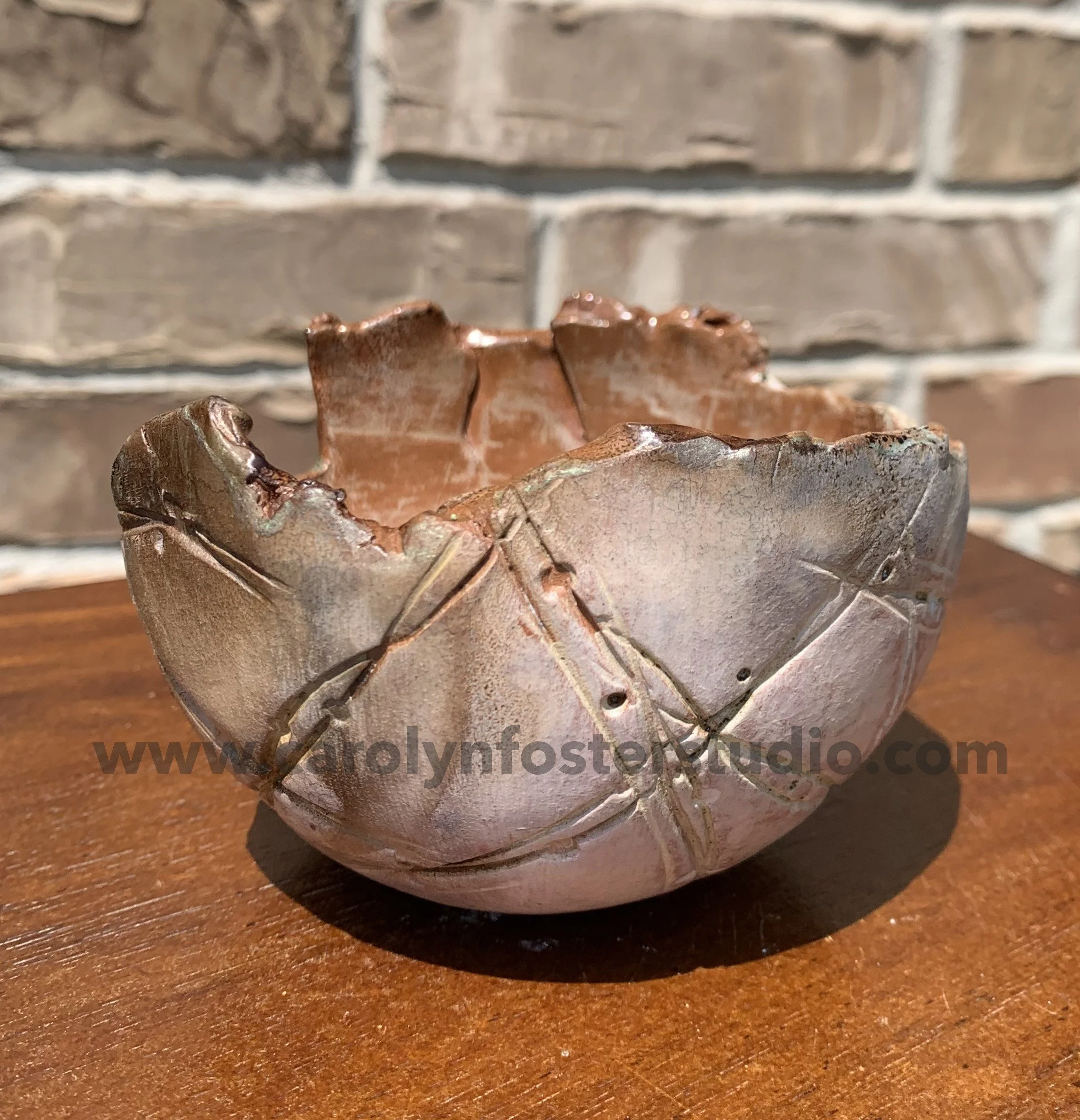 Handbuilt Raku fired watermarked.jpg
