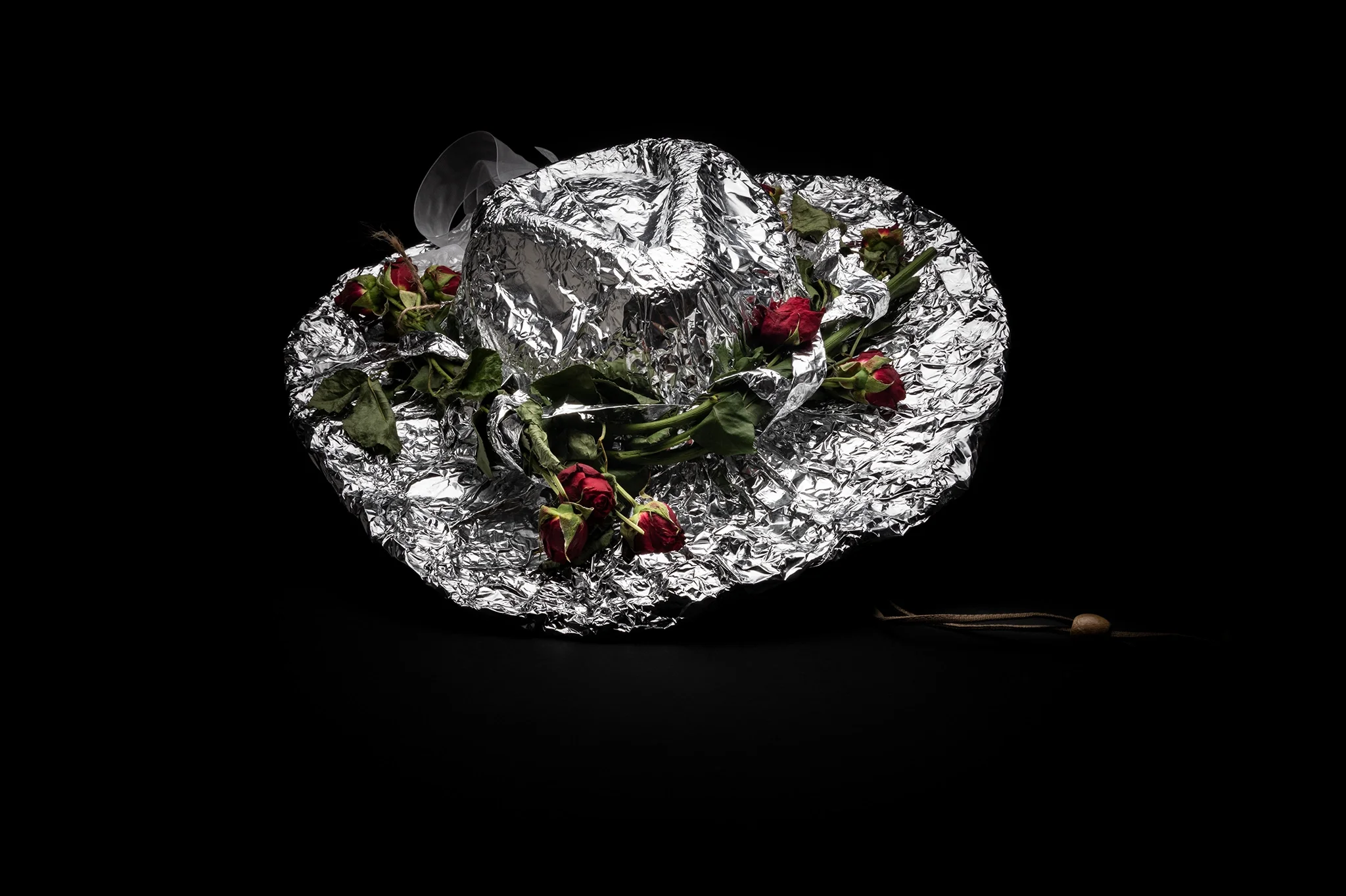 Kentucky Derby — satiric tin foil hat decorated with flowers - Product shot on black background