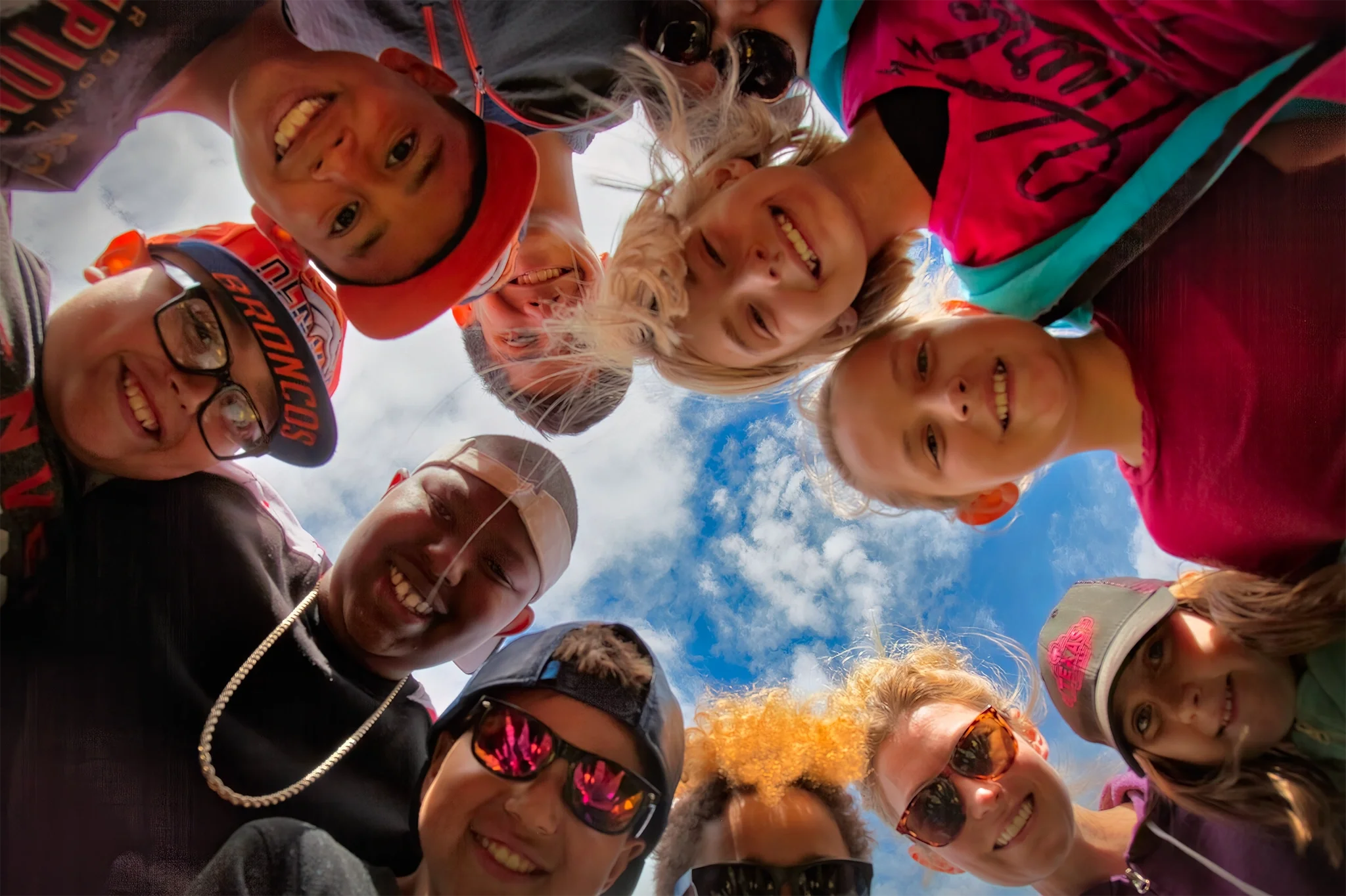 National Volunteer Awards — children at play, Kids are in a huddle looking down