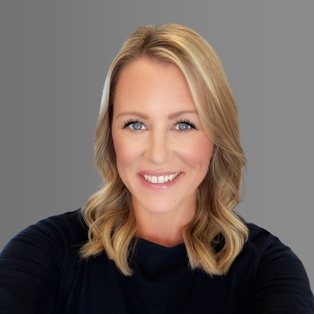 Professional portrait of Erin Steinmetz, founder of Lace Up Creative and strategic marketing advisor for B2B technology companies.
