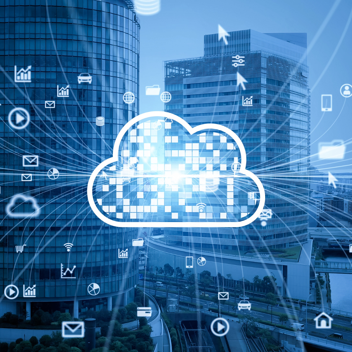 A digitally superimposed cloud icon with digital symbols representing data and connectivity over a cityscape with modern glass office buildings.