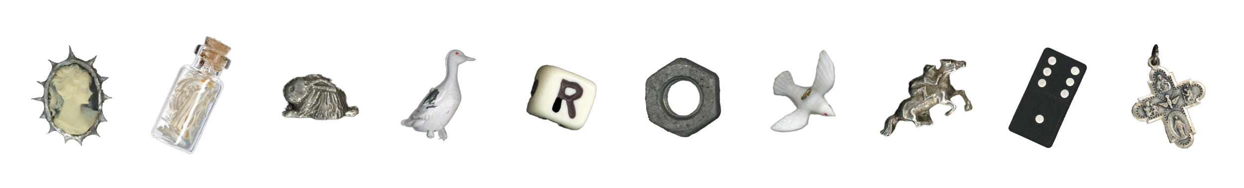 A collection of ten small objects arranged in a row, including a bottle cap with cream inside, a small glass bottle with a cork, a silver elephant figurine, a white goose figurine, a letter 'R' die, a grey bolt, a white bird figurine, a silver unicorn figurine, a domino with white dots, and a silver cross pendant.