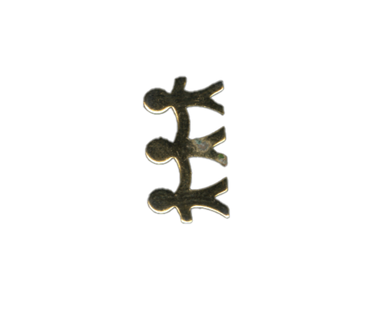 A metallic jester or clown head charm or pendant with a reflective surface.