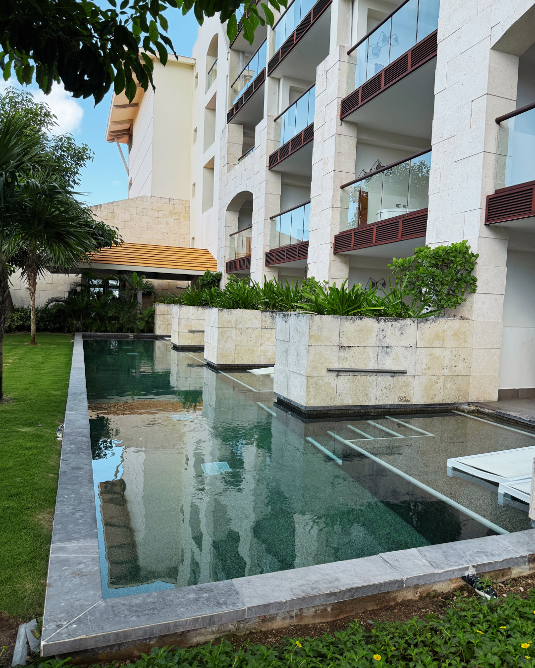 Modern courtyard with reflecting pool at Unico Resort, Riviera Maya