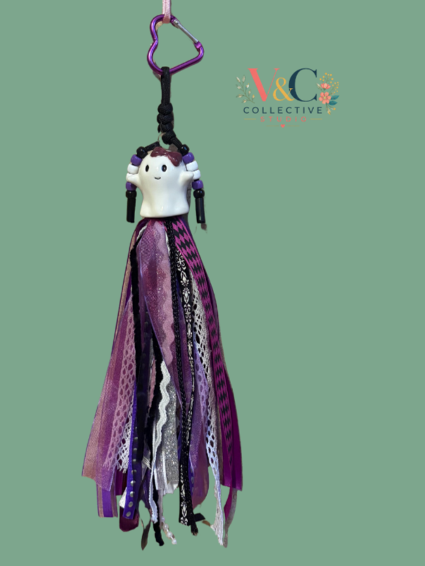 Girl gost purple purse charm.png