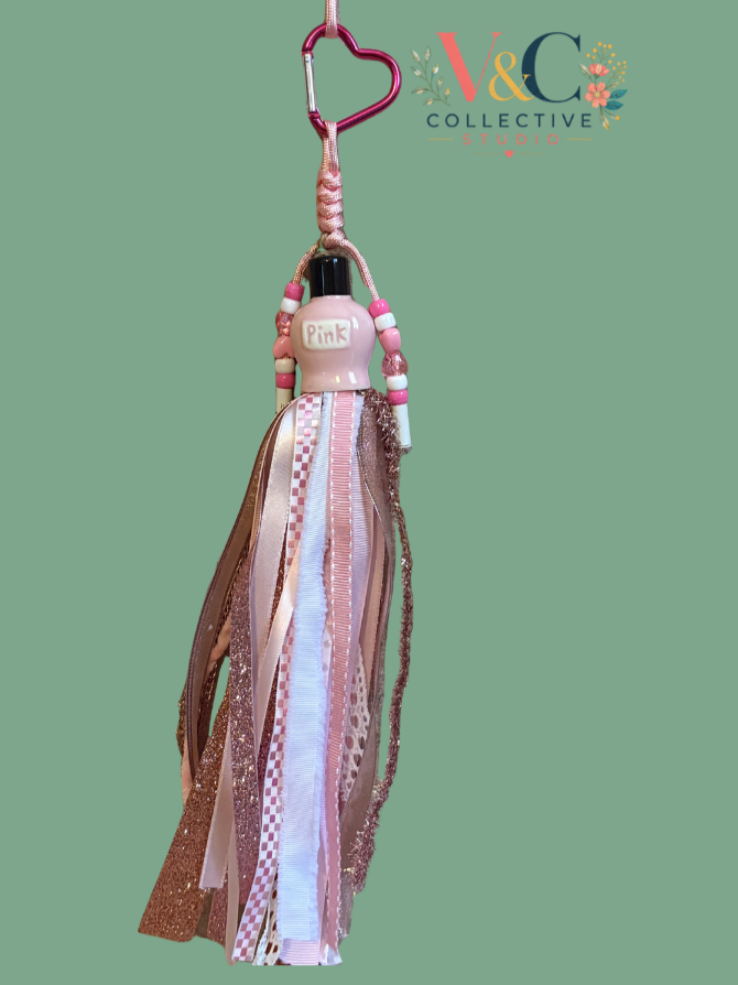 Pink purse charm.png