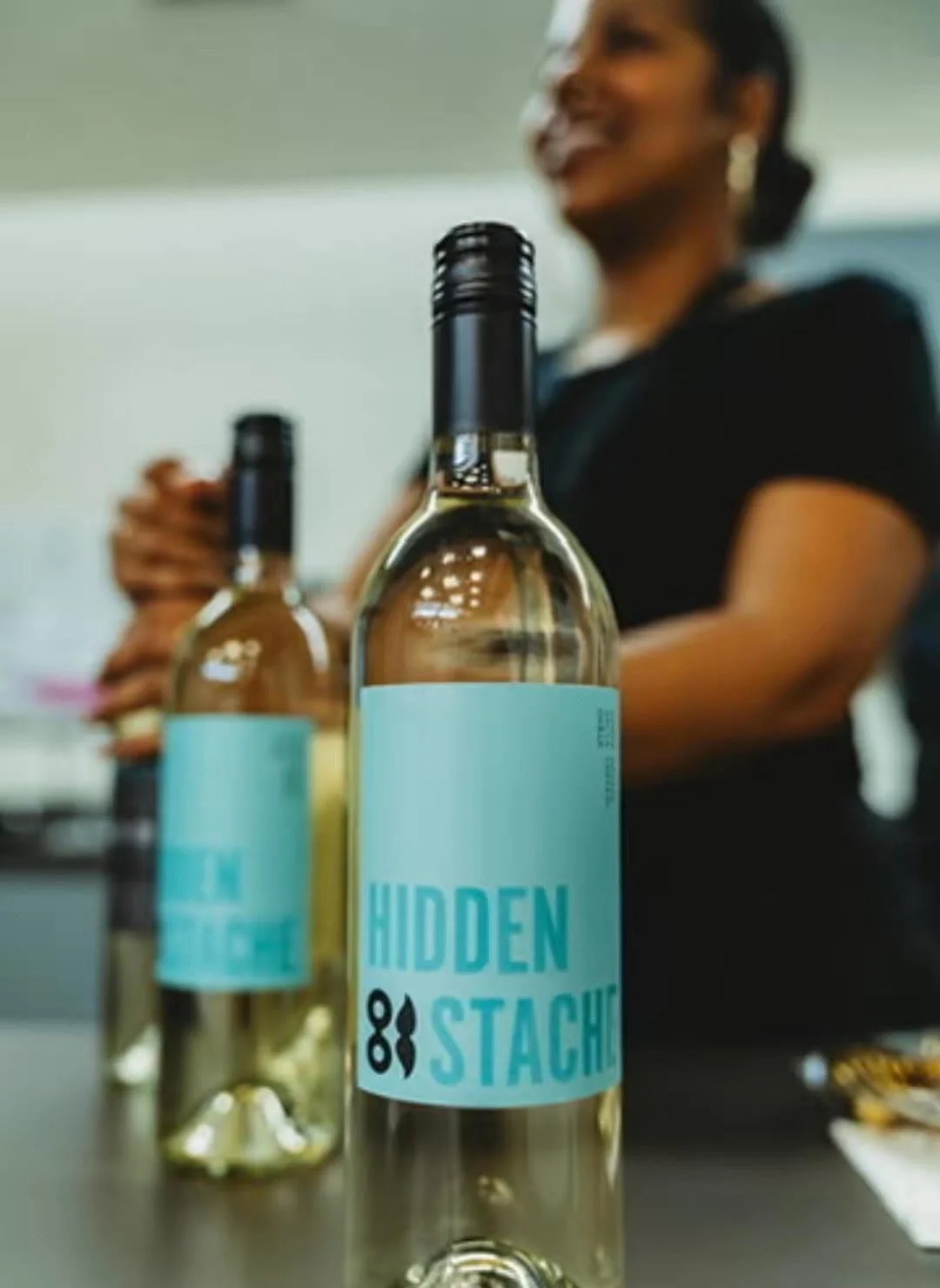 Vegan wine selections at a food & wine tasting experience featuring 'HIDDEN STACK' wine.