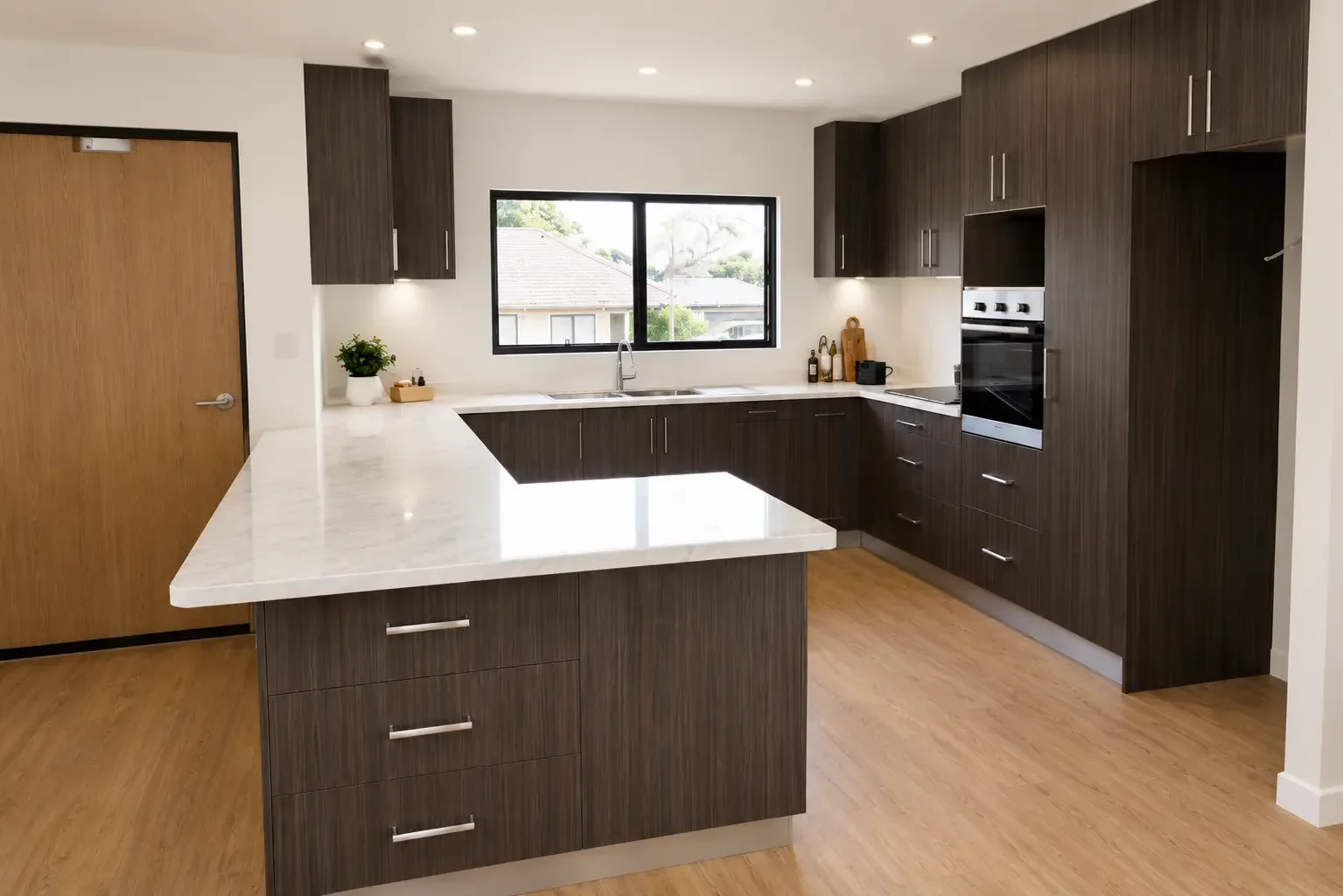 Custom white kitchen cabinetry with timber accents