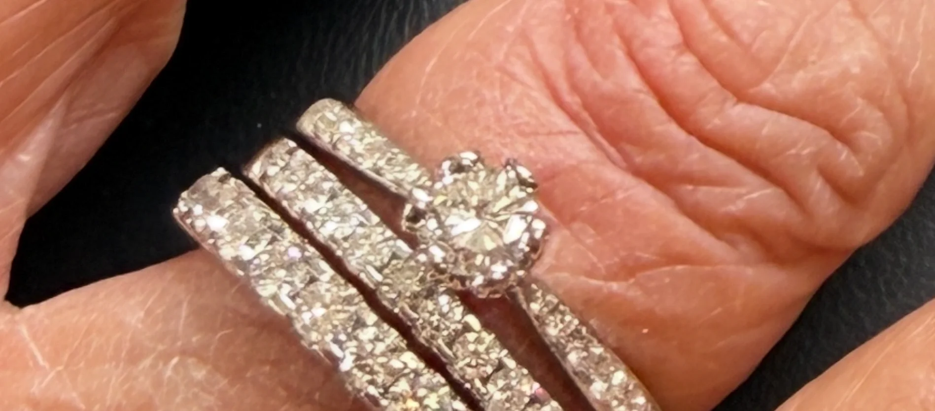 A customer review that is showing the three rings she bought from us!
