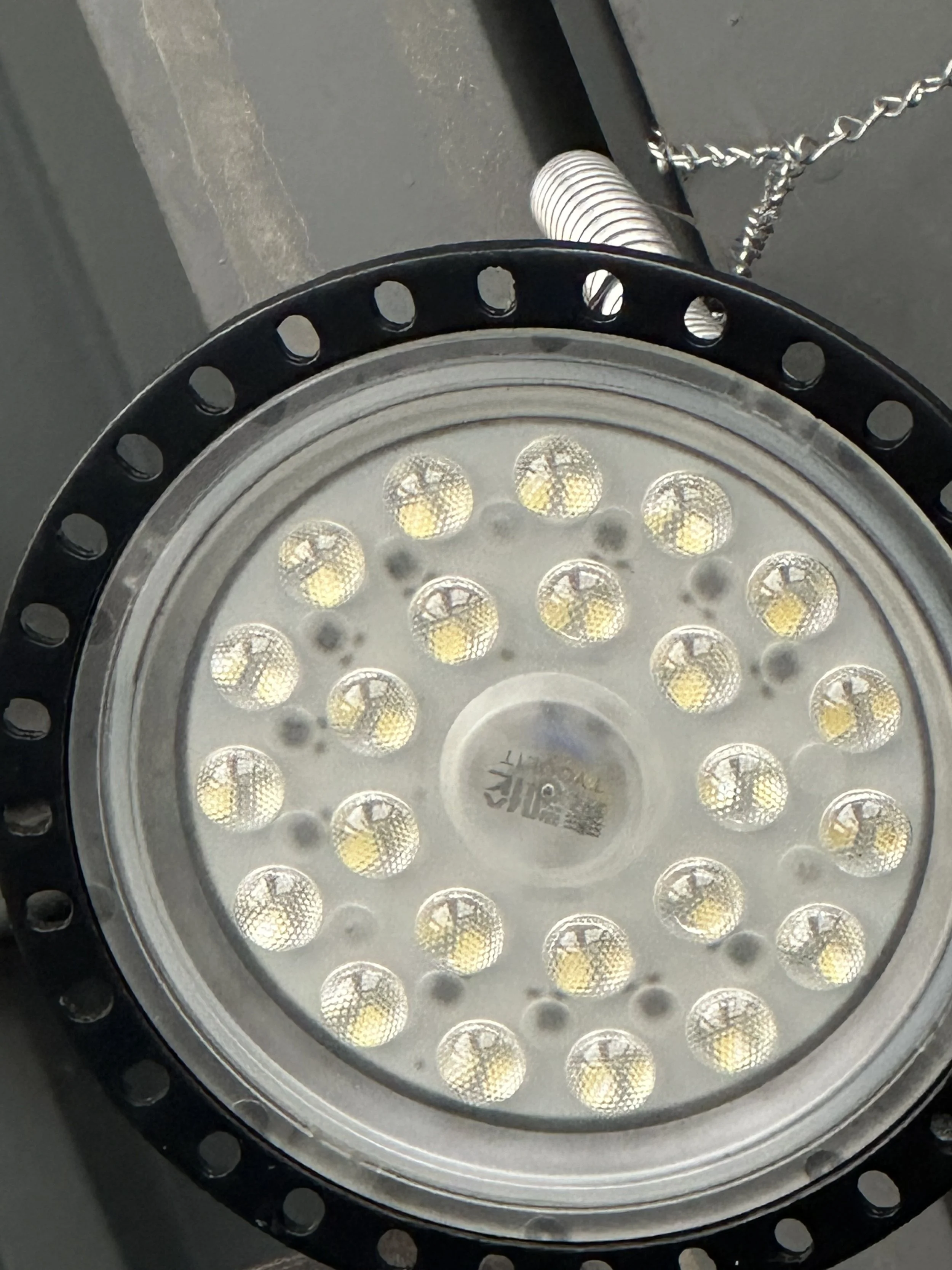 Close-up of an LED light bulb with multiple small LED lights arranged in a circular pattern.