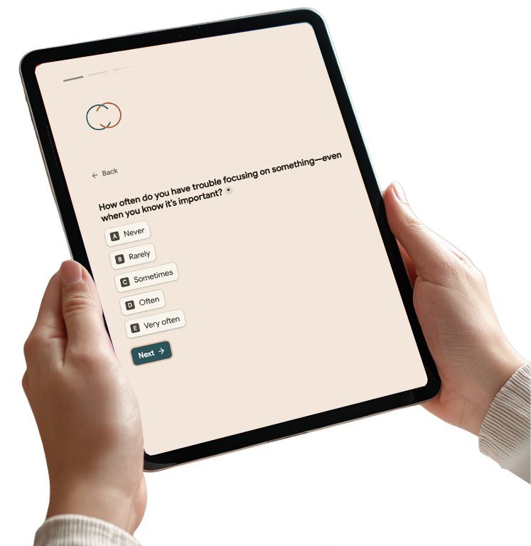 A person holding a tablet displaying a survey question from an ADHD Evaluation Quiz about difficulty focusing, with multiple choice answers and a 'Next' button.