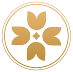 Tracy Thorne Acupuncture circular gold flower logo with four stylized petals around a central dot