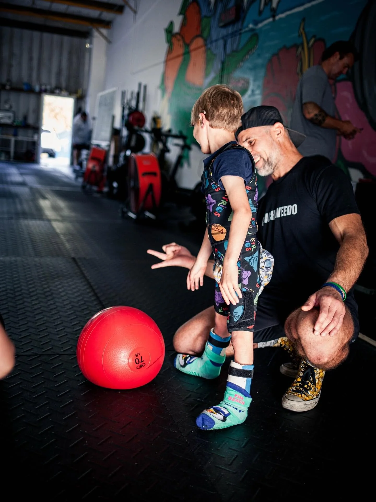 Coach and young athlete at CrossFit Willpower