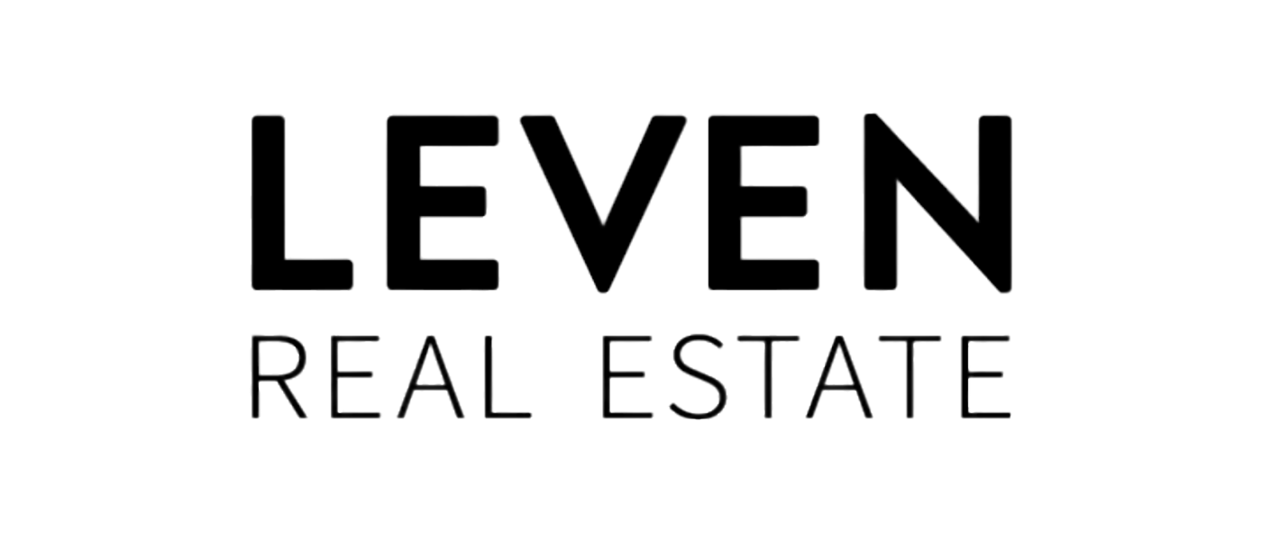 Logo of LEVEN REAL ESTATE in black and white.
