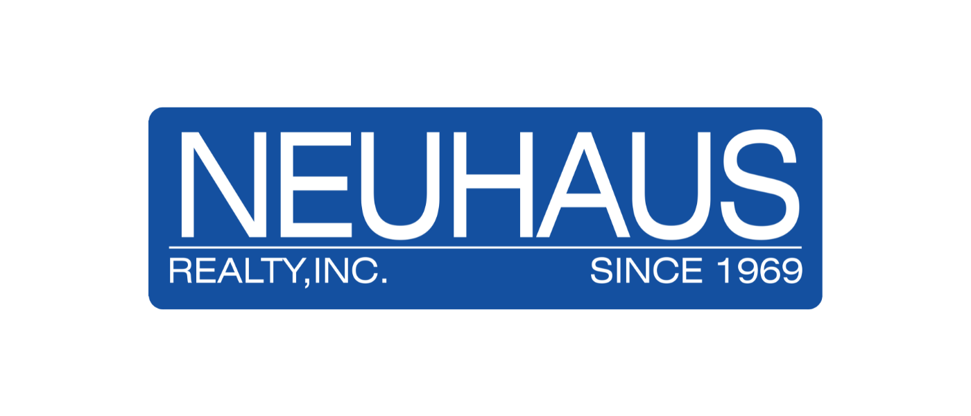 Neuhuas Realty Inc. logo with year 1969 and blue background