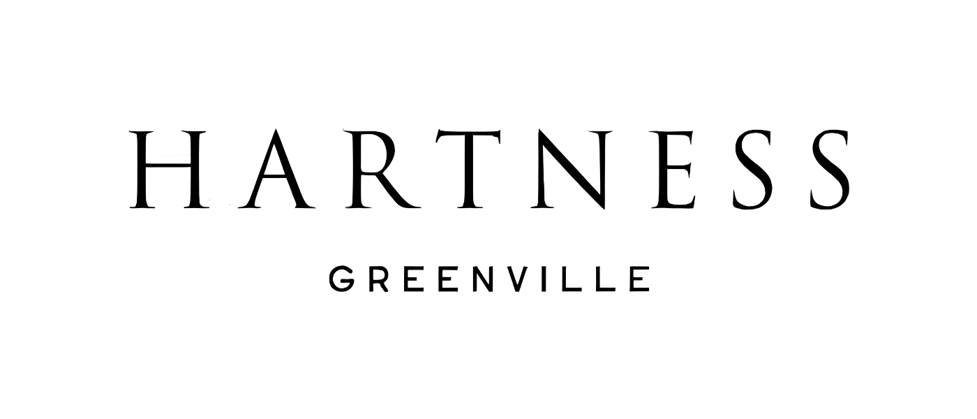 HARTNESS GREENVILLE logo with black text on a white background
