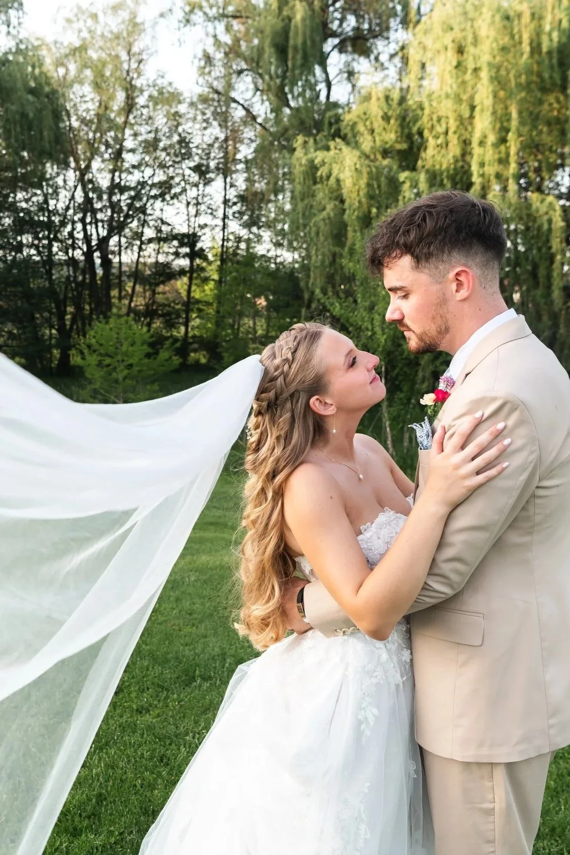 Bride and groom embracing at The Wind in the Willows in Grantville, PA