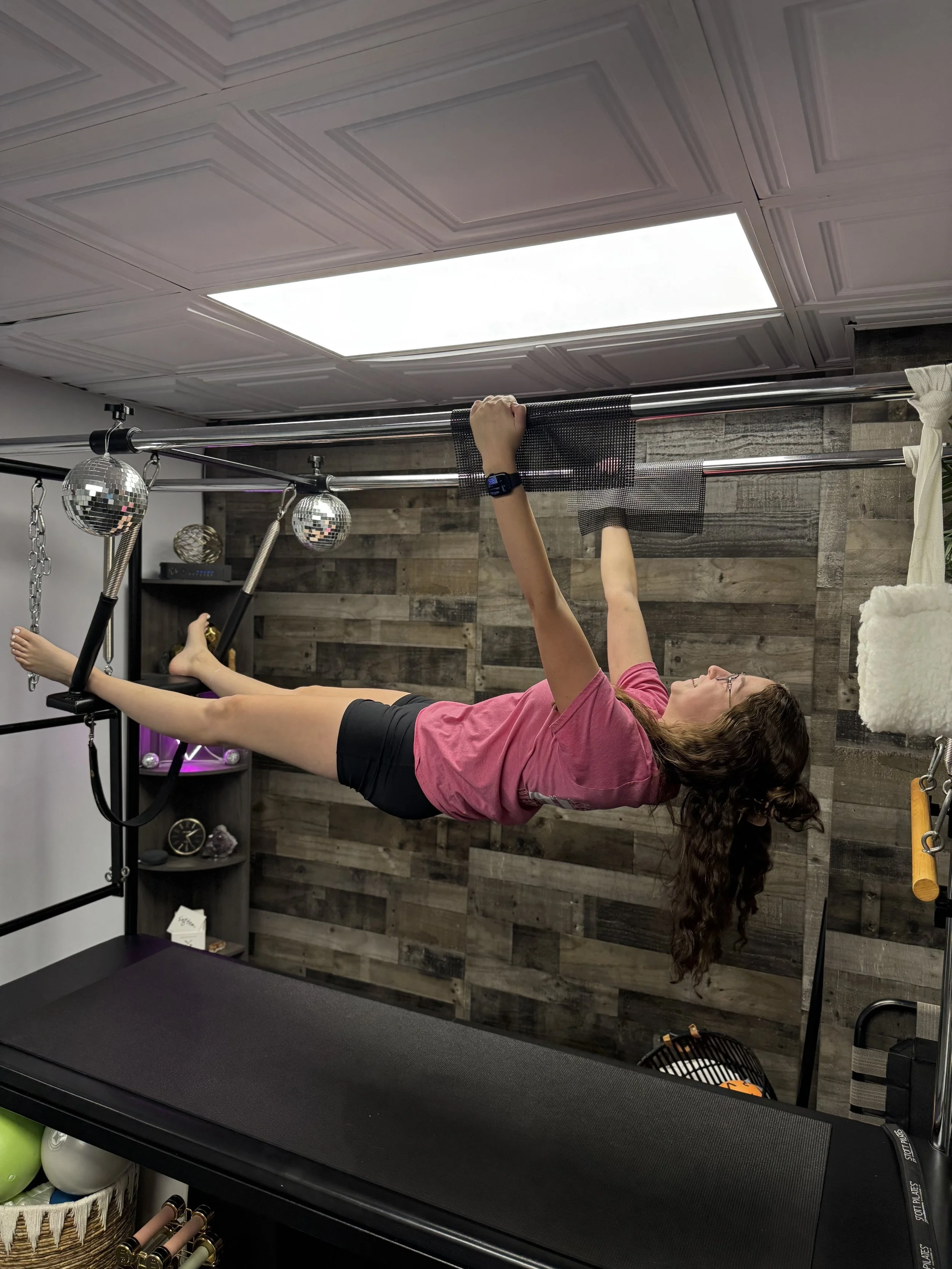 Aeryn Rutt on the Pilates Cadillac at MVMNT social in St Clair Shores, MI