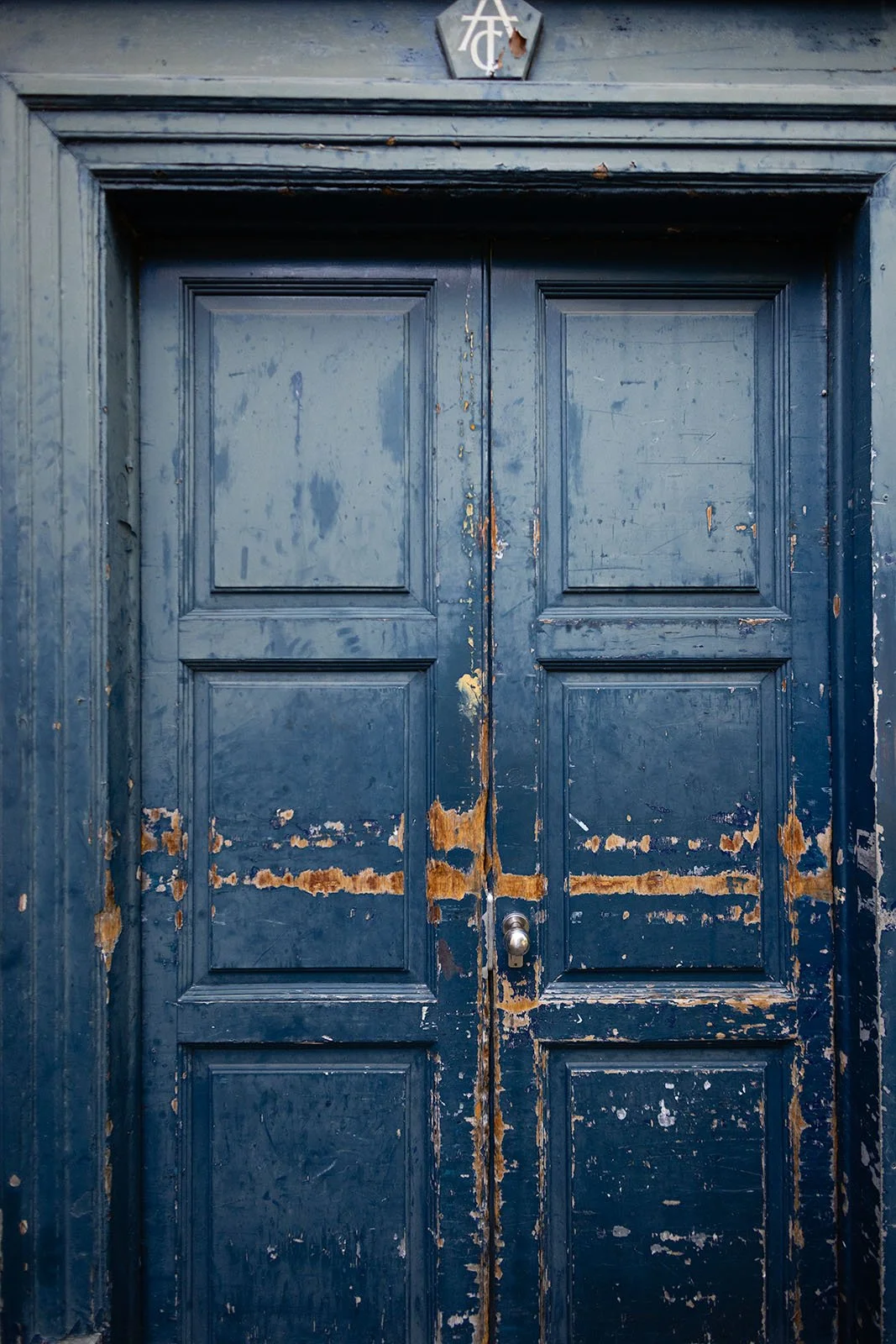 Battered blue door