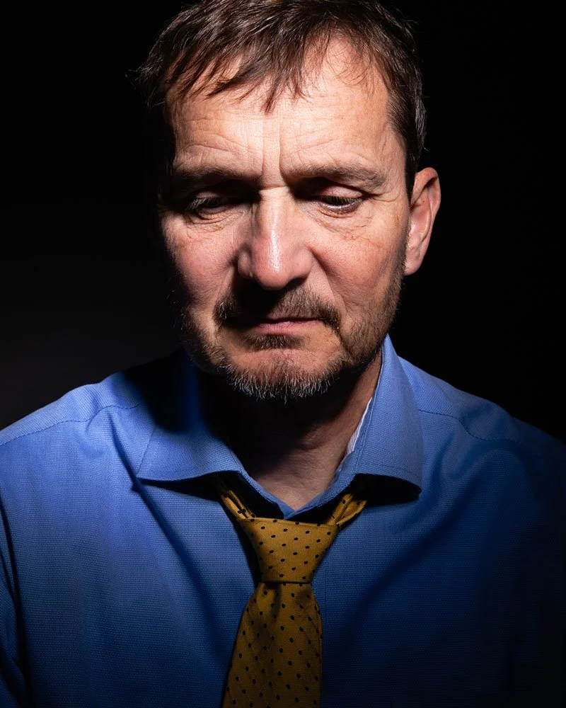 Studio portrait of an older man