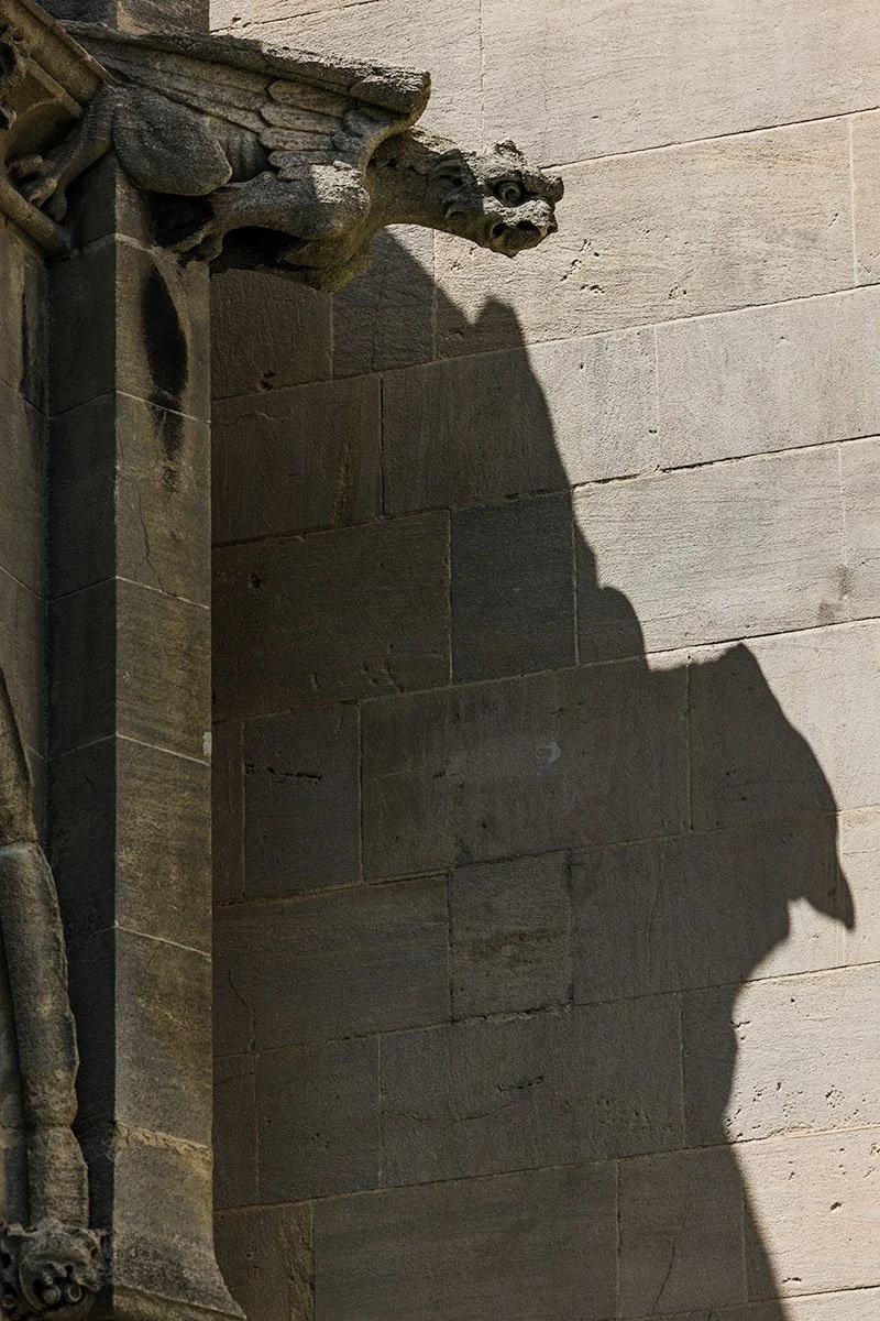 Gargoyle with long shadow