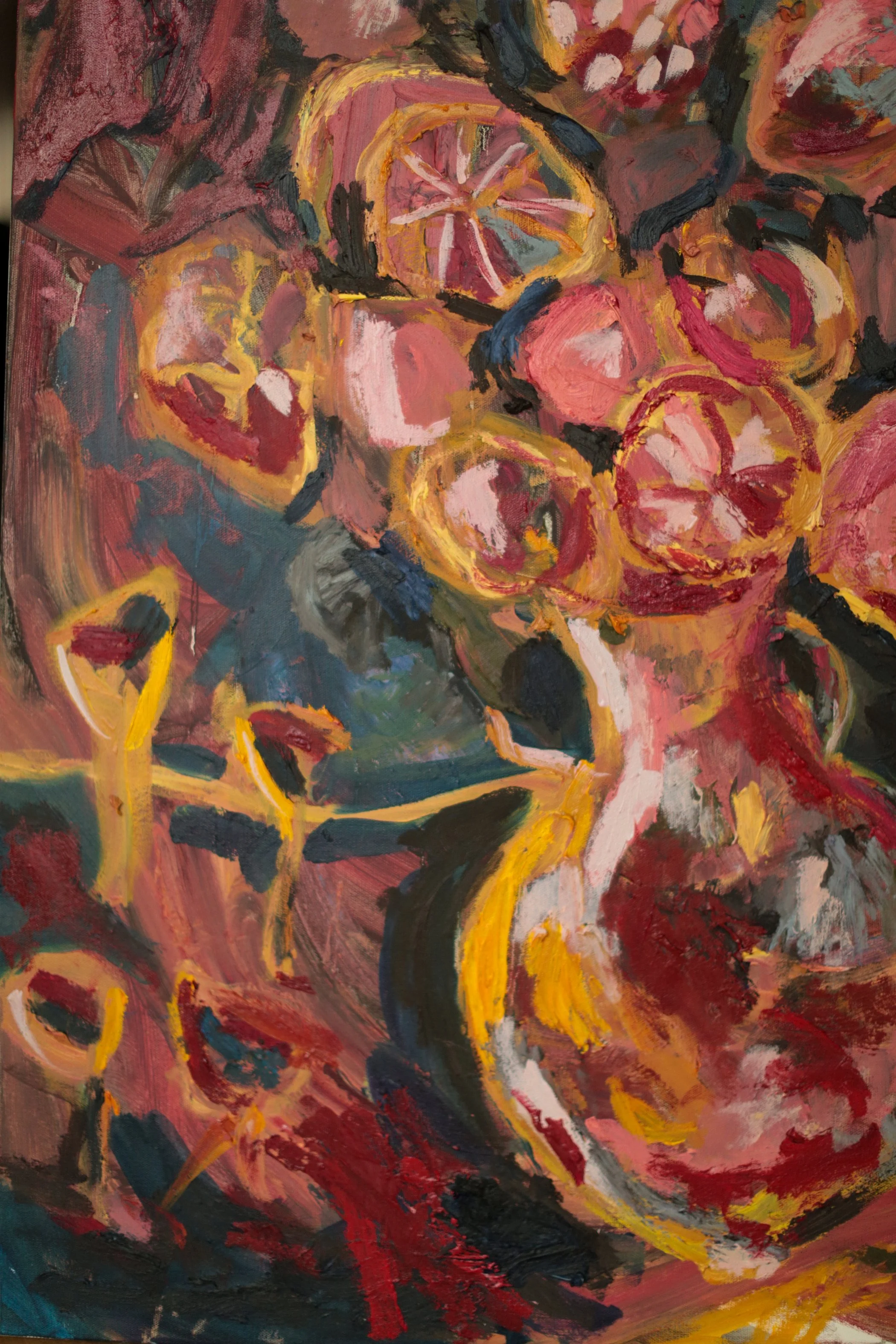 Detail of The Bacchanal by Erin Smith, the wine decanter and coral blooms with stemmed glasses in yellow oil stick