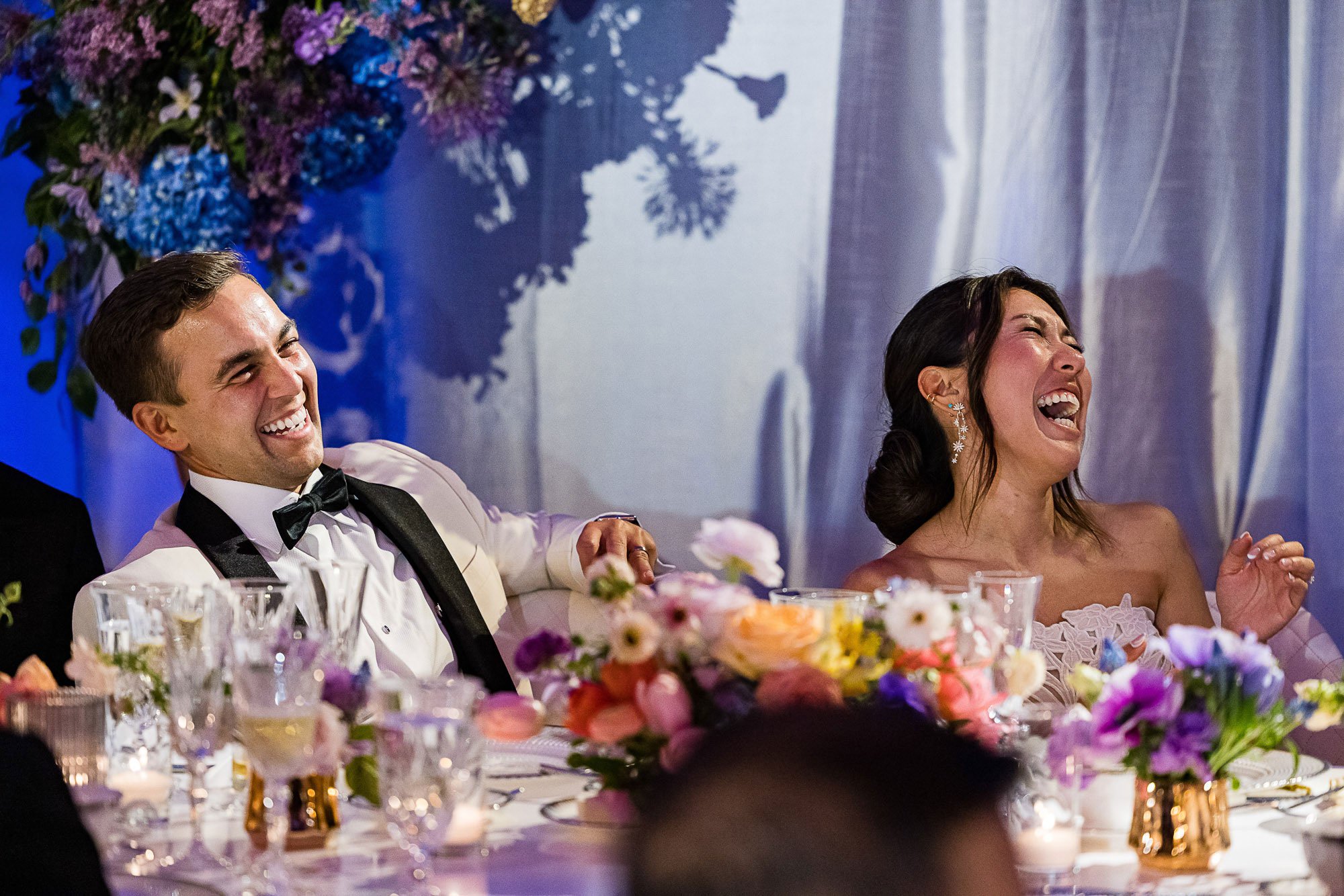 tara-arrowood-academy-of-sciences-reception-couple-laugh.jpg