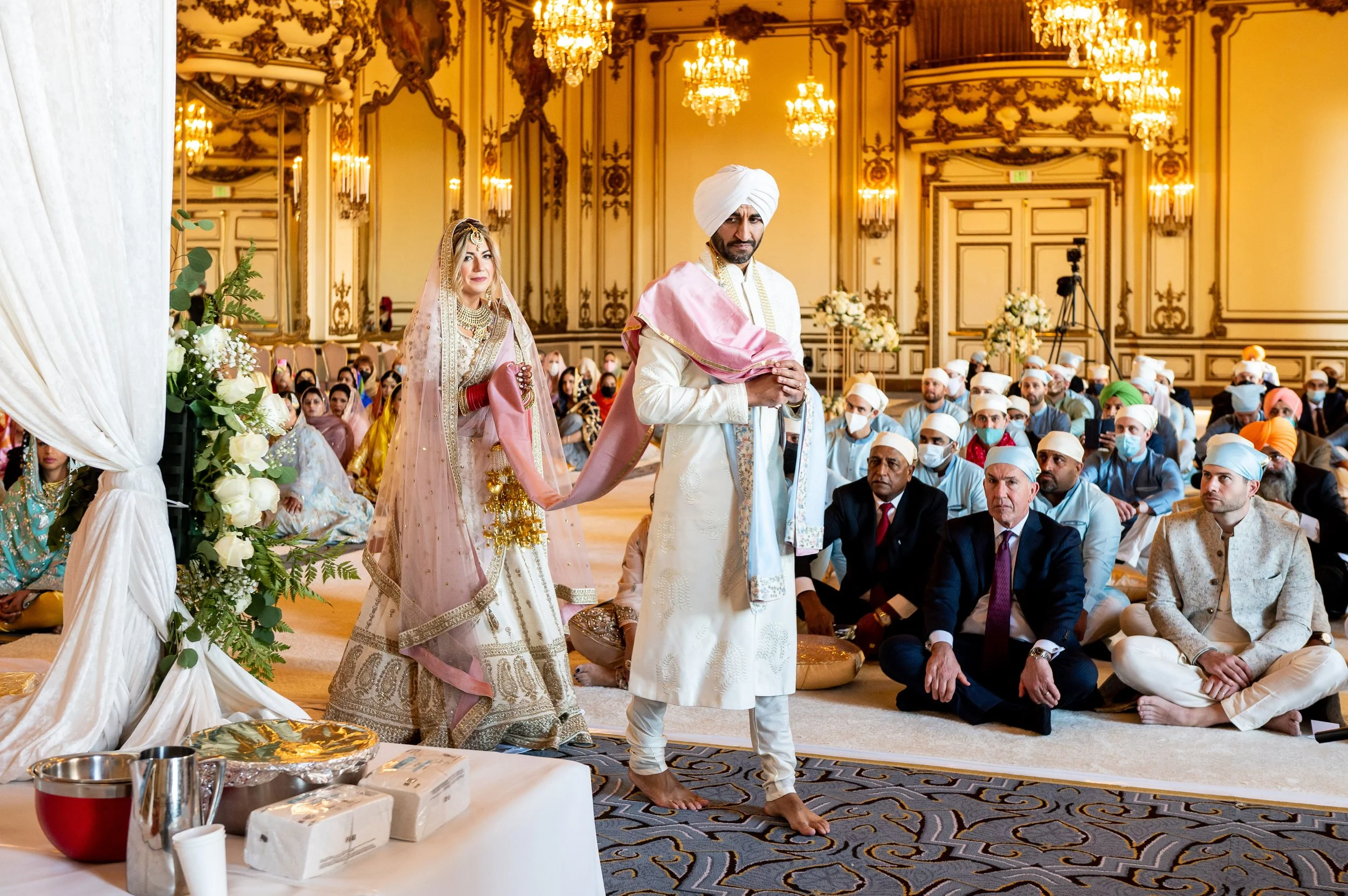 Sikh wedding ceremony in the gilded ballroom at the Palace Hotel, San Francisco
