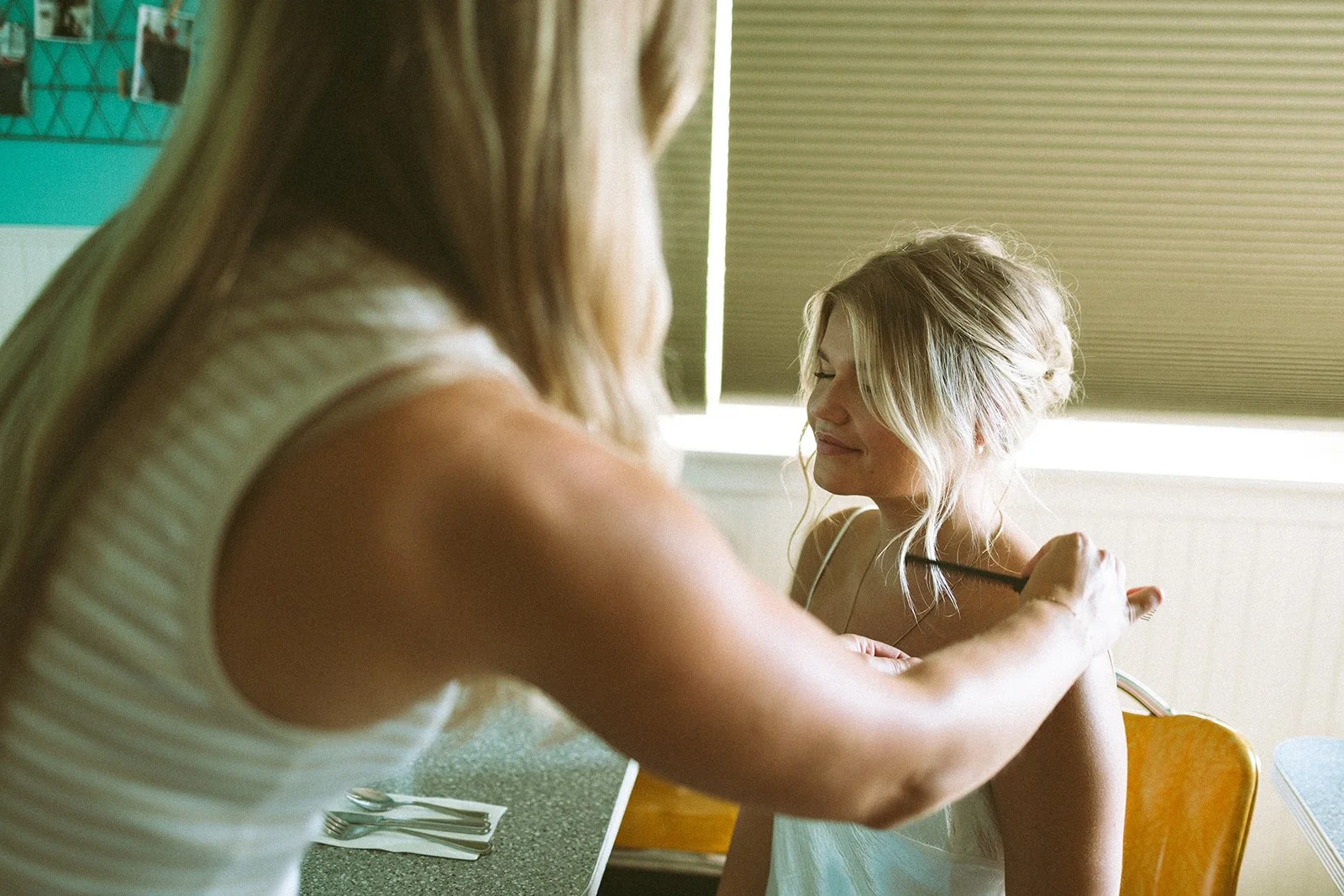 Bridal hairstylist creating an effortless wedding hairstyle for a Washington bride