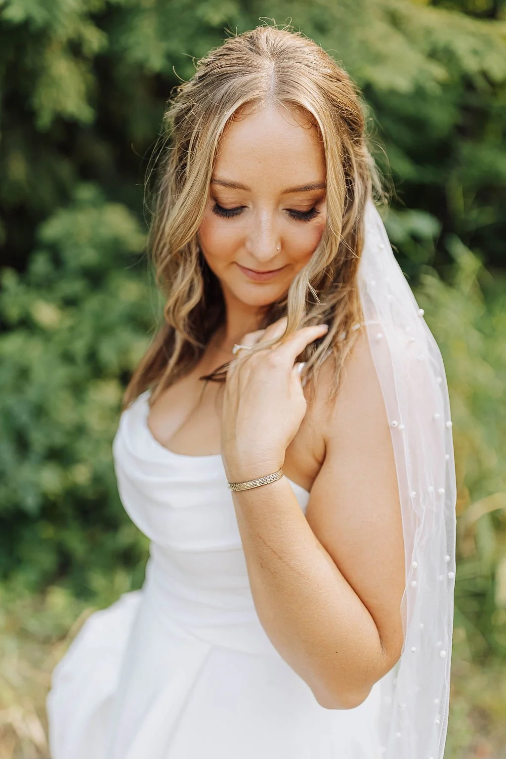 by Emily Anne Merrill - Bride wearing romantic bridal hair and natural makeup in Northwest Washington