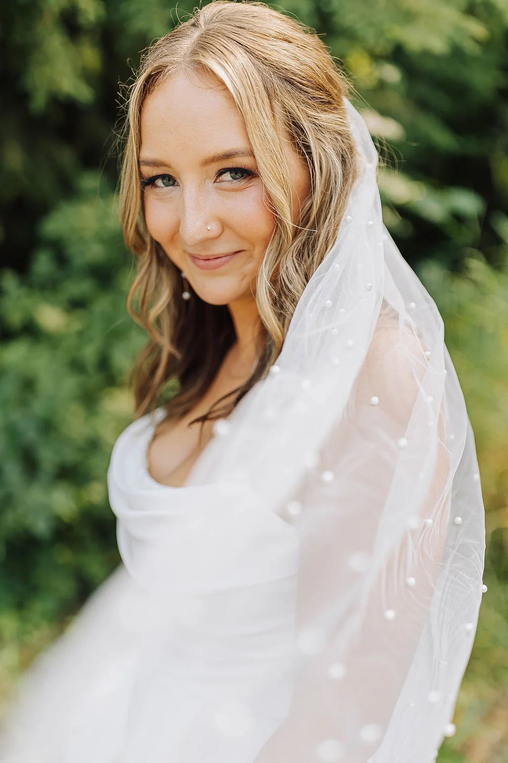 by Emily Anne Merrill - Bride wearing romantic bridal hair and natural makeup in Northwest Washington