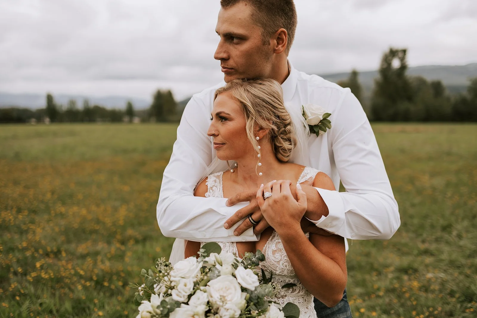 by Meraki Photography  NW - Bride wearing elevated bridal hair and natural airbrush makeup in Northwest Washington