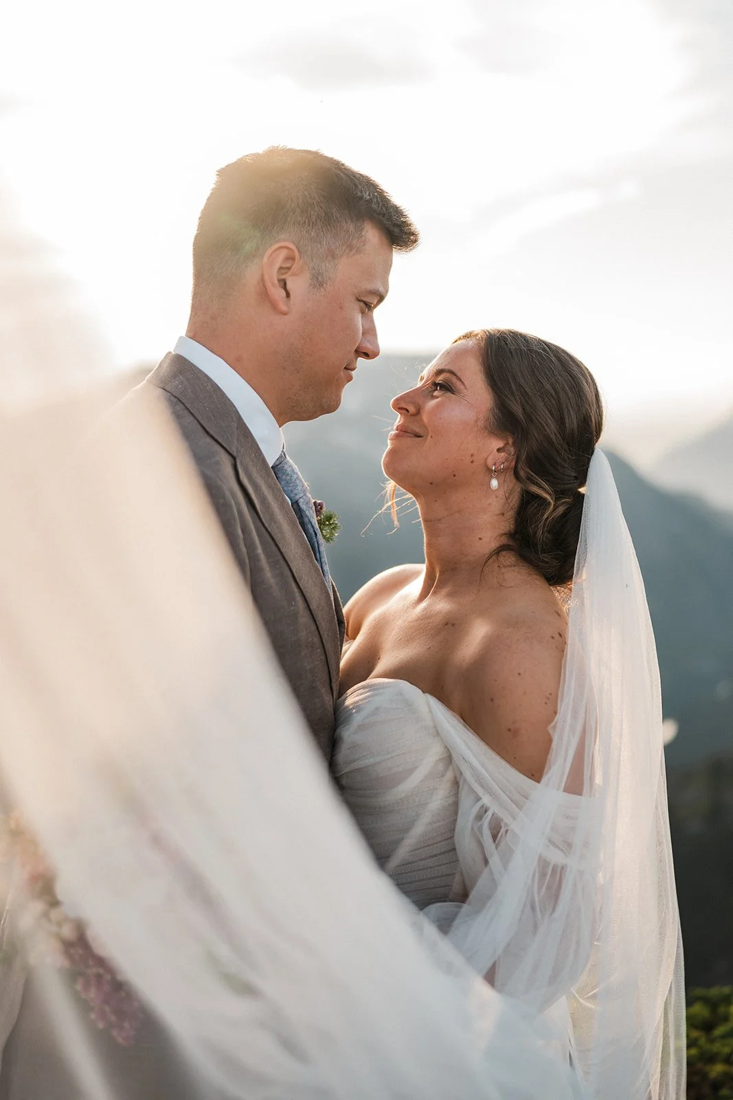 by Between the Pines - Bride wearing a romantic bridal hairstyle for a Mt. Baker wedding