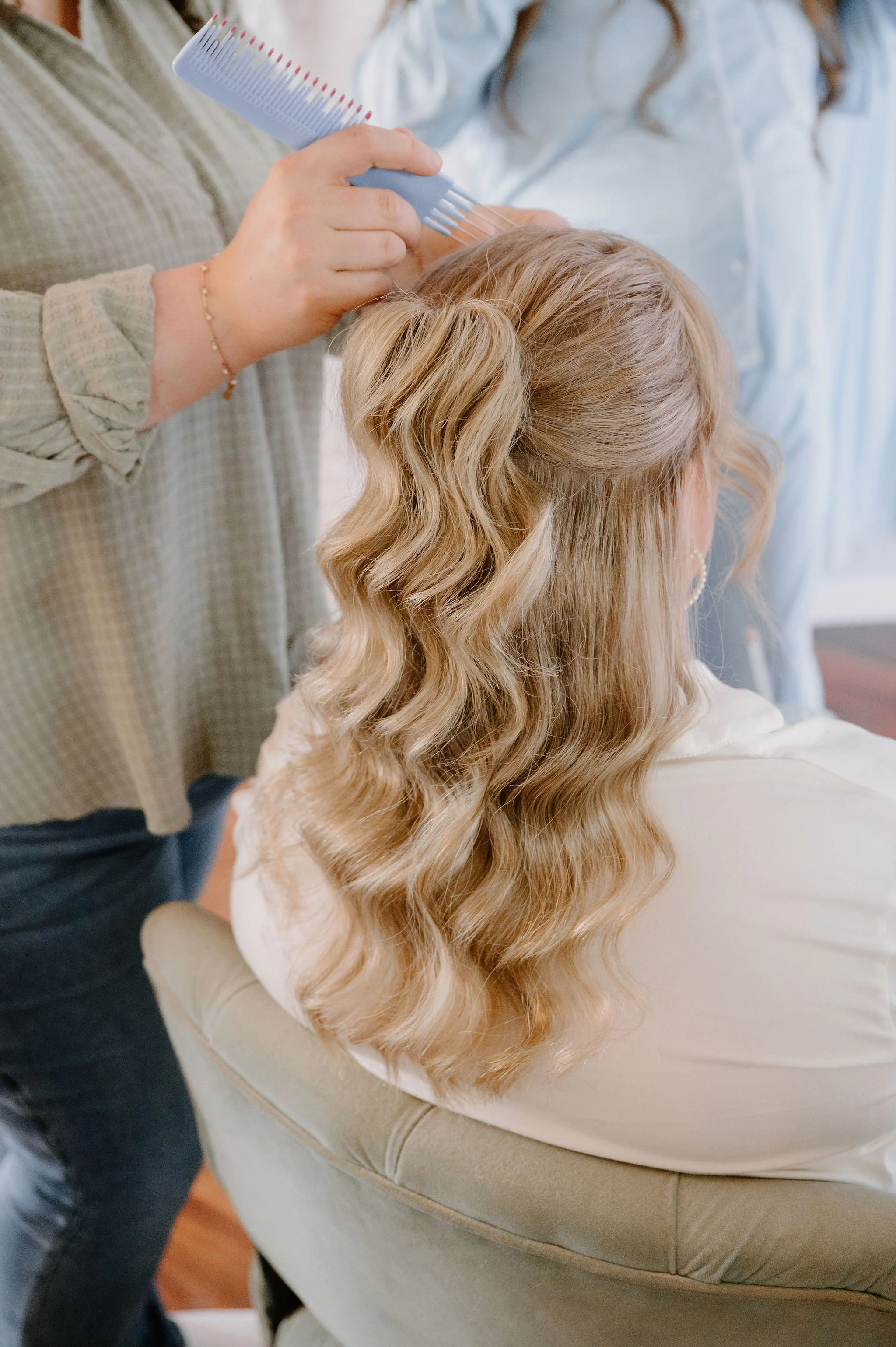Bridal hairstylist creating an effortless wedding hairstyle for a Washington bride